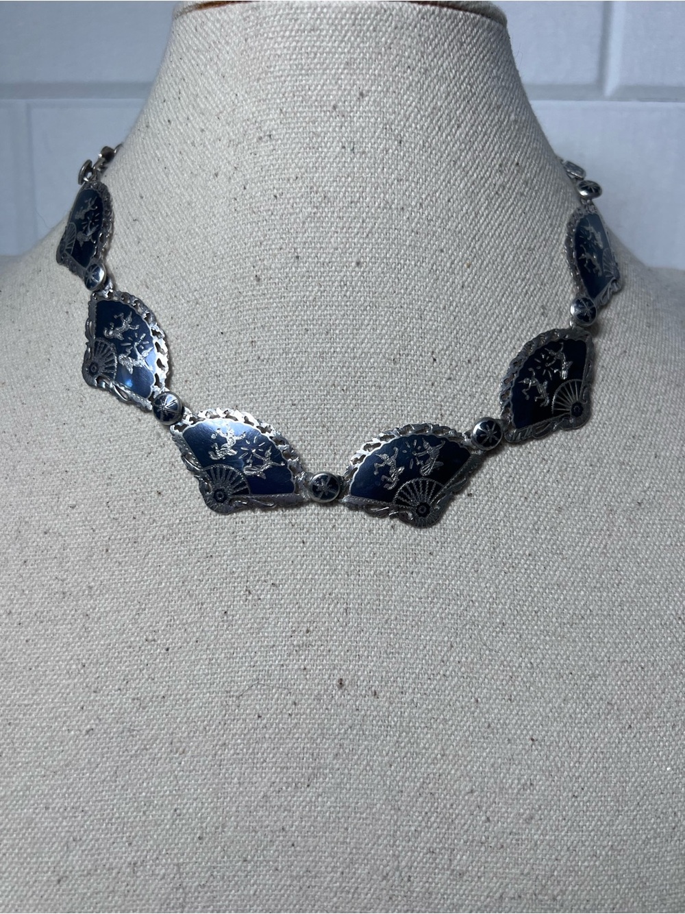 Vintage sterling silver Siam choker features intricate black enamel work